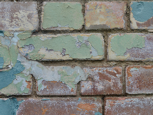 Removing paint from a brick